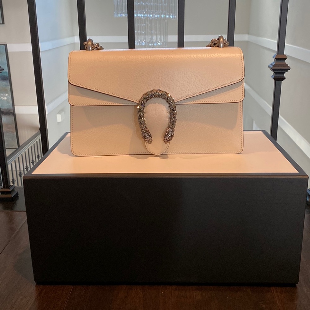 Gucci white neutral bag. Used once. Looks brand new. No scratch. Mint condition